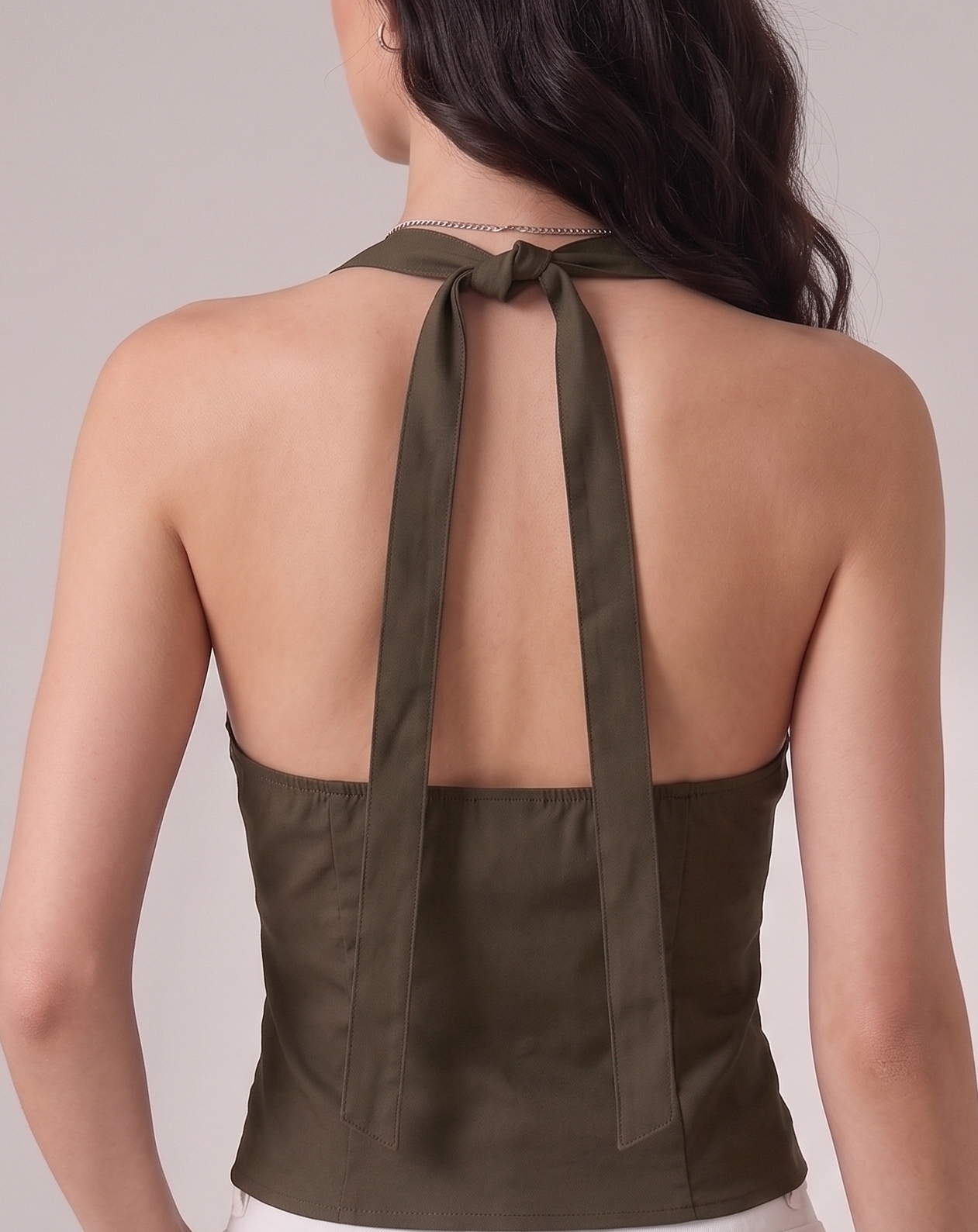 laced halter tie around